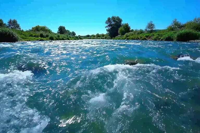 Natural spring-fed river, illustrating the difference between spring water and alkaline water sold in Las Vegas